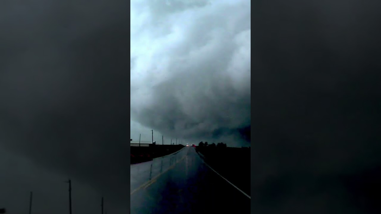 Absolute monster tornado crossing the road in front of us. Radar recorded EF5 level winds here.