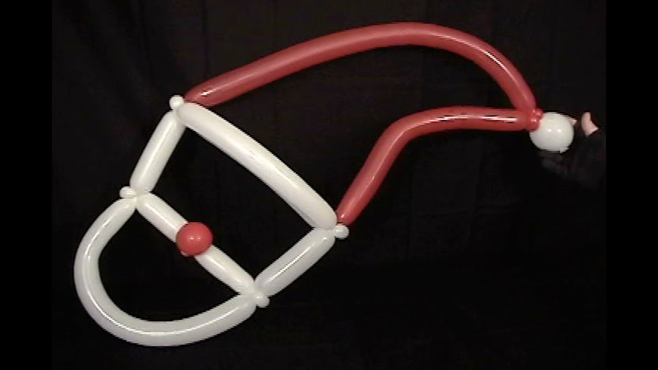 Learn how to make a balloon animal Santa Claus Mask using balloon twisting