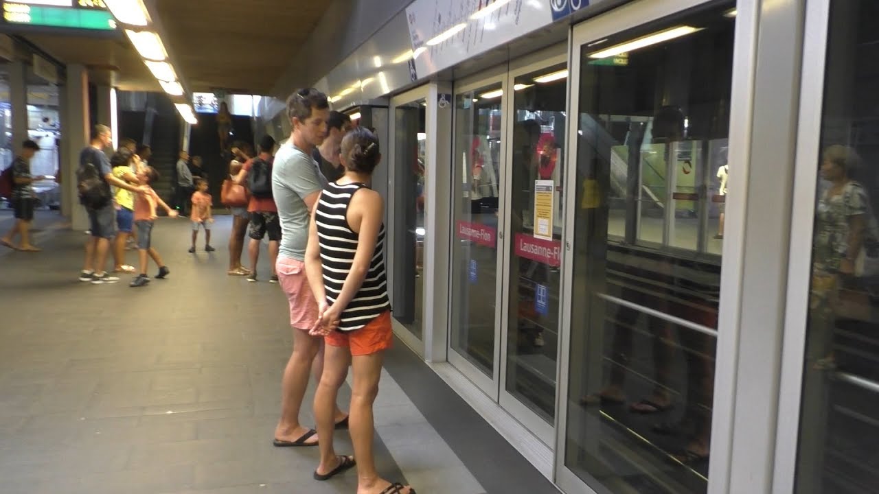 Riding the Bright and Happy Trains of Lausanne, Switzerland!