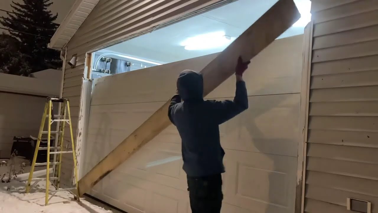 increasing garage door size without removing door