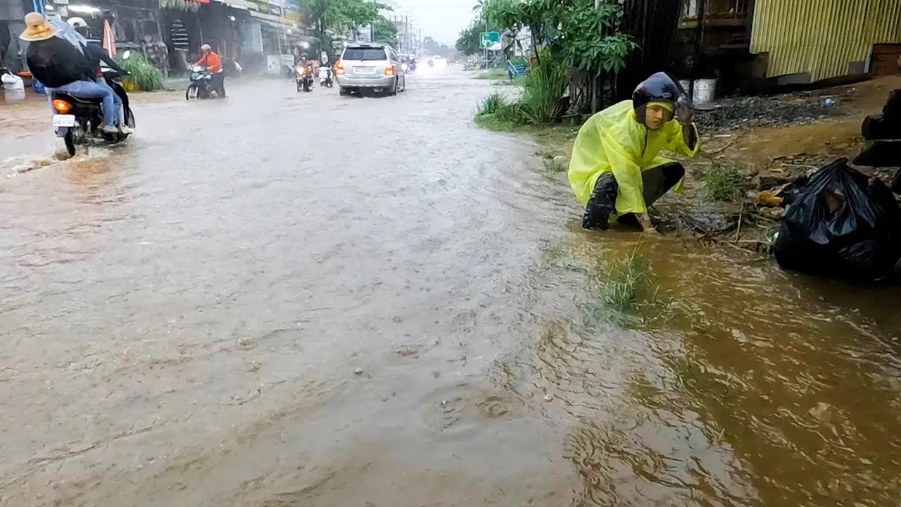 Draining Flooded Streets Clearing Blocked Storm Drains