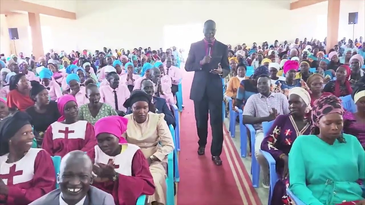 ** Pastor Simon Deng Lual ** Preaches the Words of God in** CTC**- in -Juba.