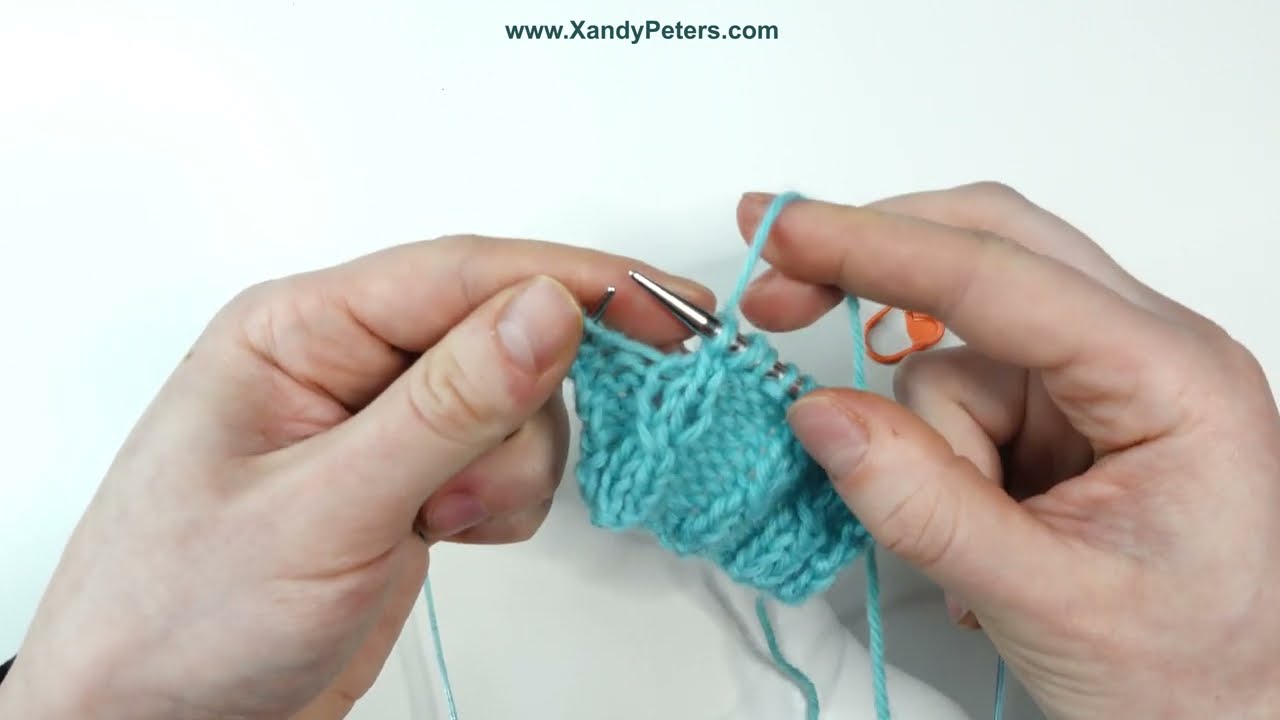 Knit Tips: How to Work a Left-Slanting Twisted Stitch