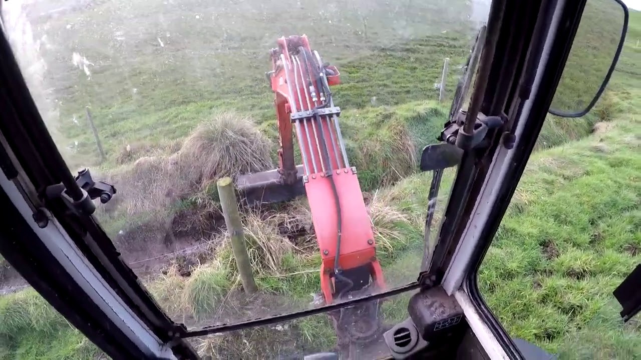 FIELD MAINTENANCE  DIGGING OUT DITCHES