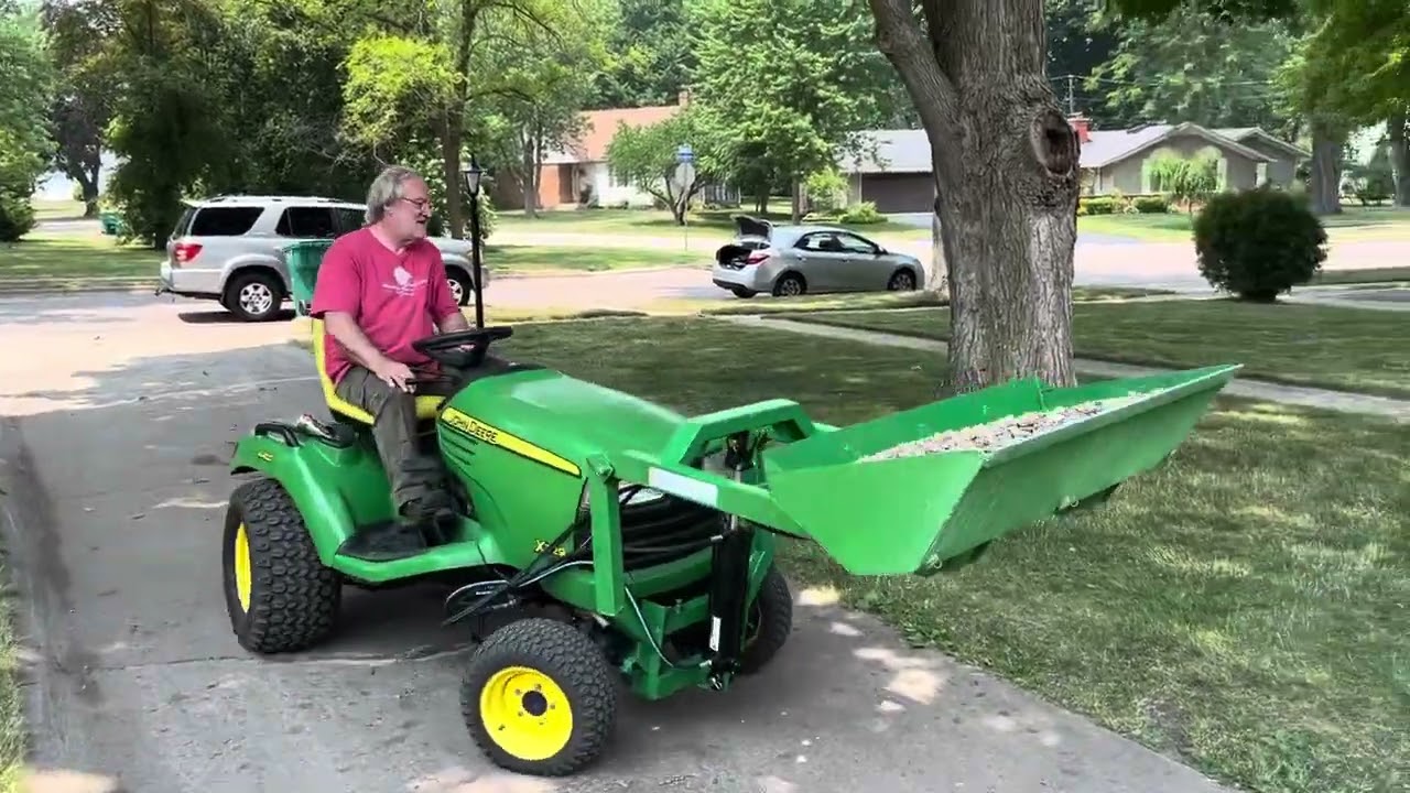 Front yard glow up with Little Buck Loader on John Deere x729