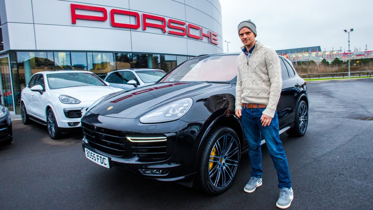 Winner Francois Chklar collects his Porsche Cayenne Turbo S