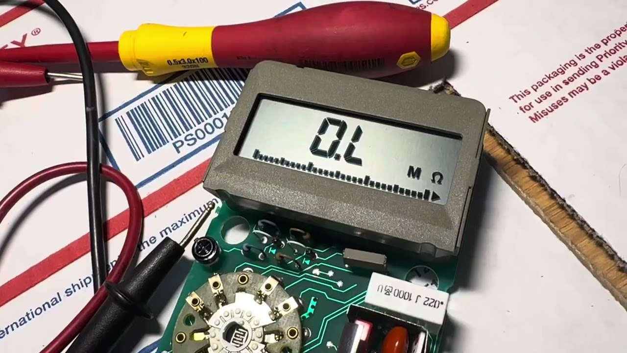 Fluke 77 volt ohm meter fixed via jumping a part. The meter had over AC voltage. F2W210 R1 is blown?