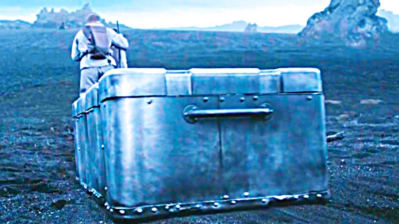 He Has To Carry A Big Metal Box Behind Him To Survive On This Planet