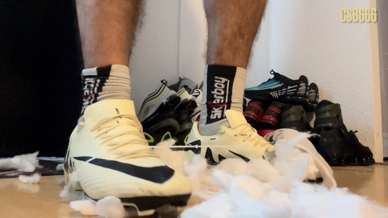 Nike Tn and Nike Air Zoom Mercurial cleats crush, stomp, trample Pillow