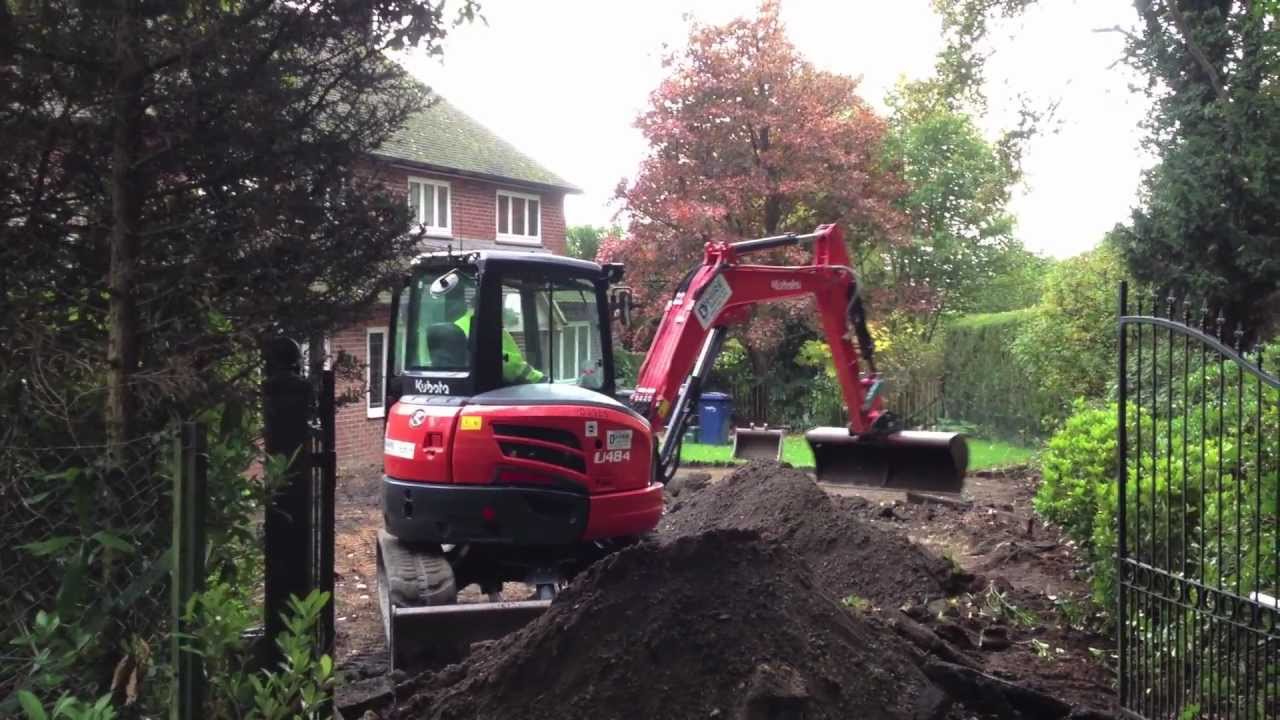 Kubota U48-4 Making A Muck Away Pile.