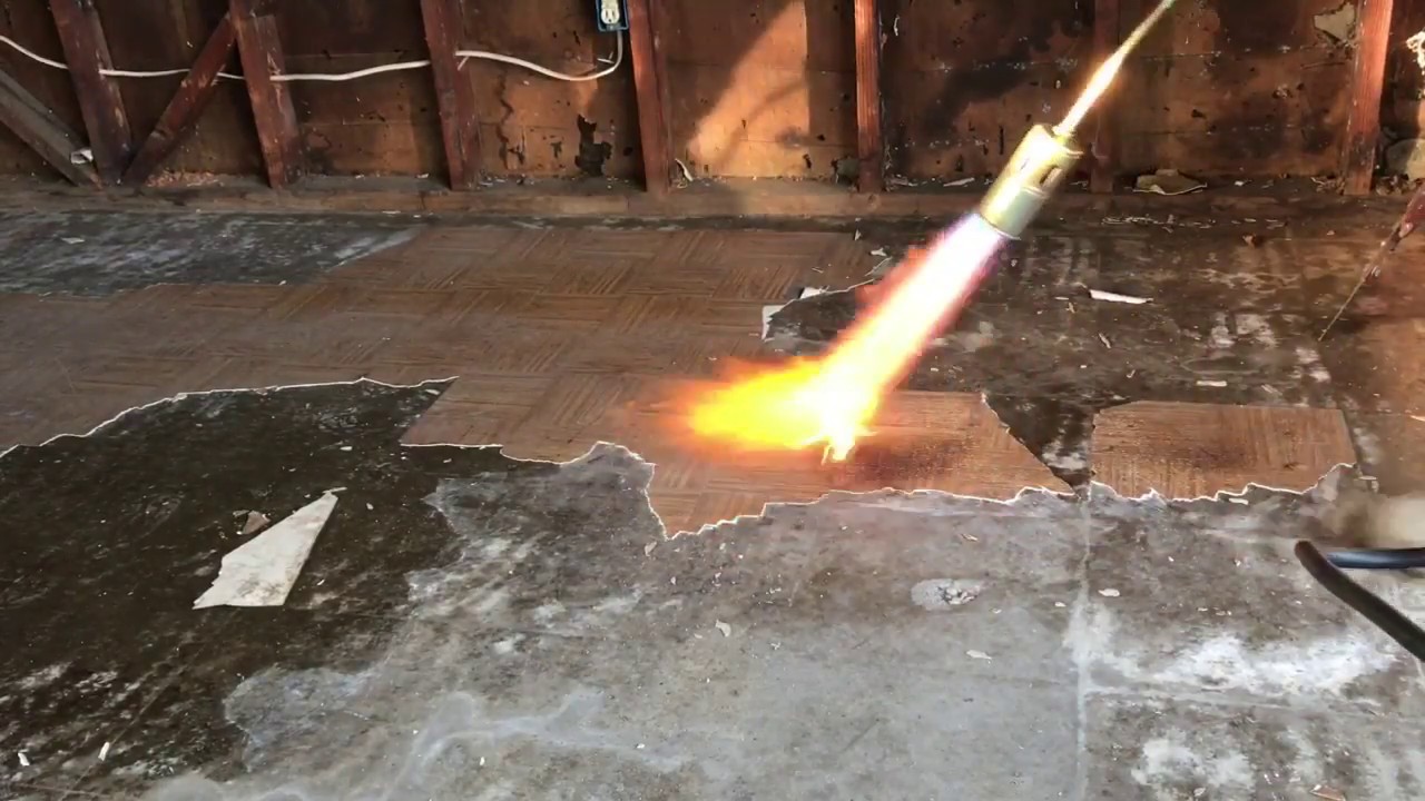 Removing linoleum flooring.