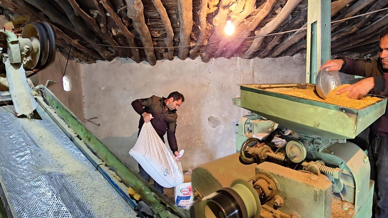 Blanching the husk for cooking rice in the mill.