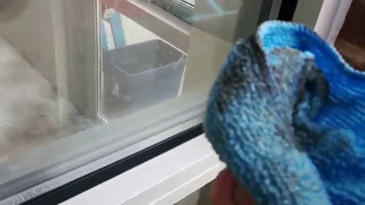 Techniques for post-construction cleaning of commercial glass