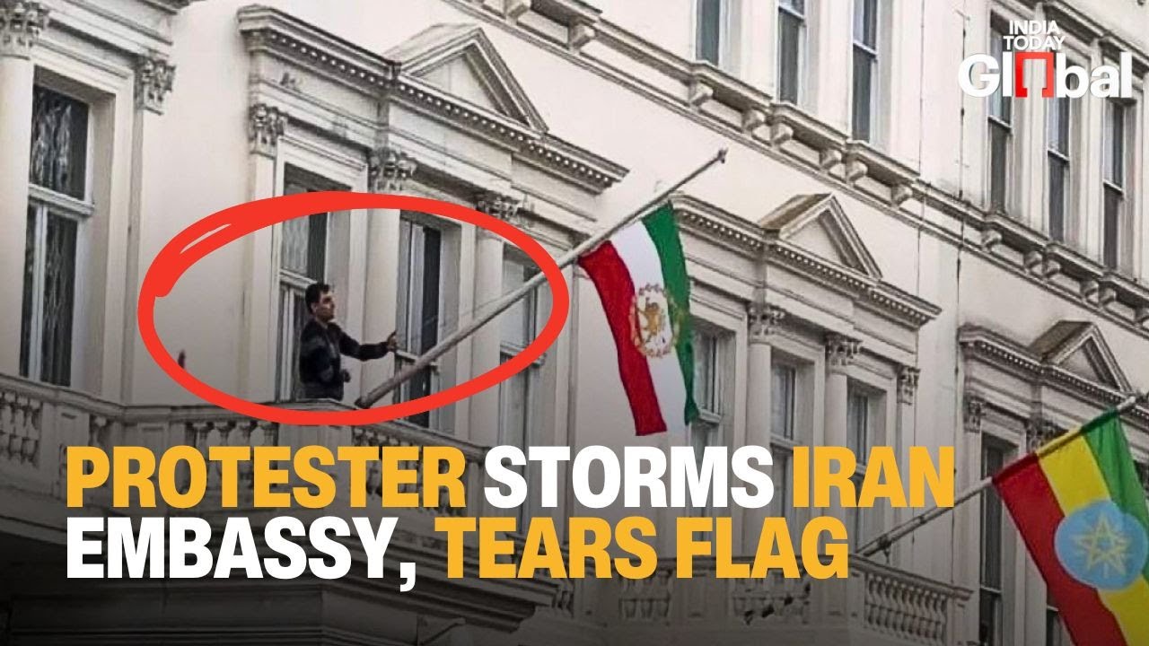 Protester Pulls Down Iranian Flag at London Embassy as Global Anti-Regime Demonstrations Intensify