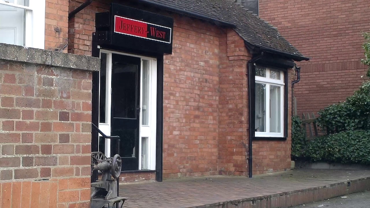Parking by the Jeffery West shoe factory shop in Northampton.