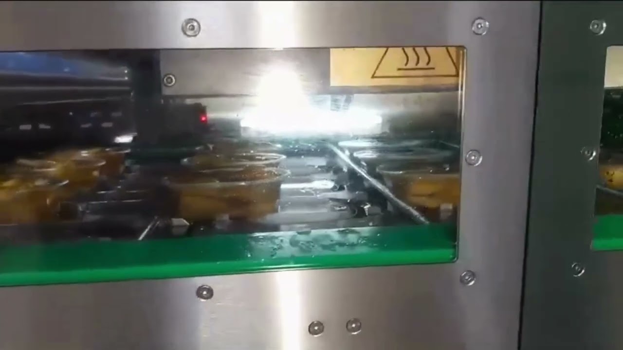 Emrich Packaging Machinery - Apack Automap 200E Inline Tray Sealer - Stuffed Peppers