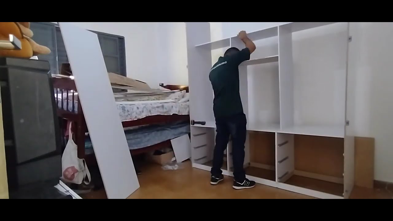montagem de guarda-roupa 3 portas de correr com 9 gavetas mas espelho.