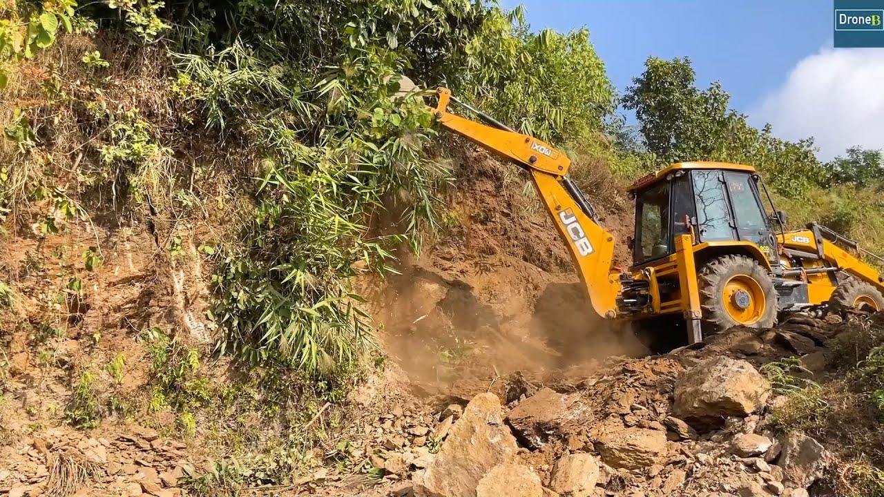 Rocky Hill Work-JCB Backhoe-Making Wider Hilly Road Turn