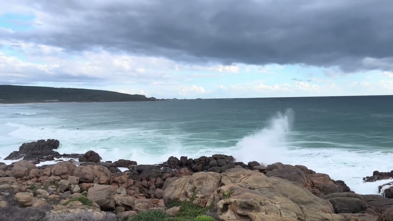 Watching waves at Yallingup beach at Leeuwin-Naturaliste National Park, Western Australia