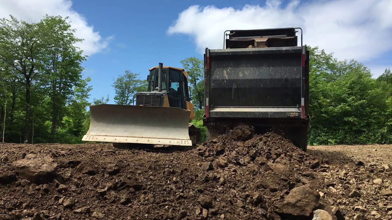 Pushing Fill with John Deere 700J