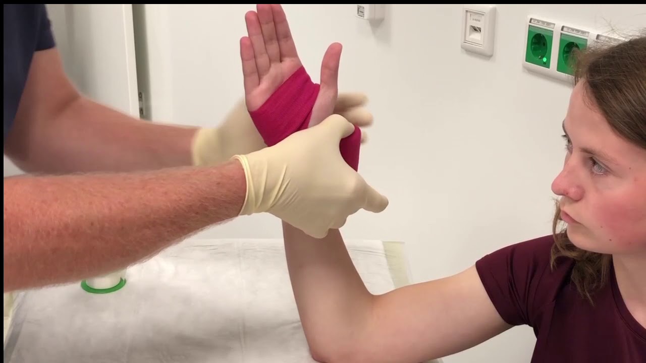 Stütz- und Fixierverband Handgelenk mit Universalbinde