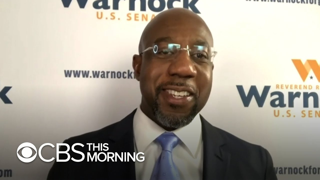 Democrats pick up at least one Senate seat with Warnock's historic victory