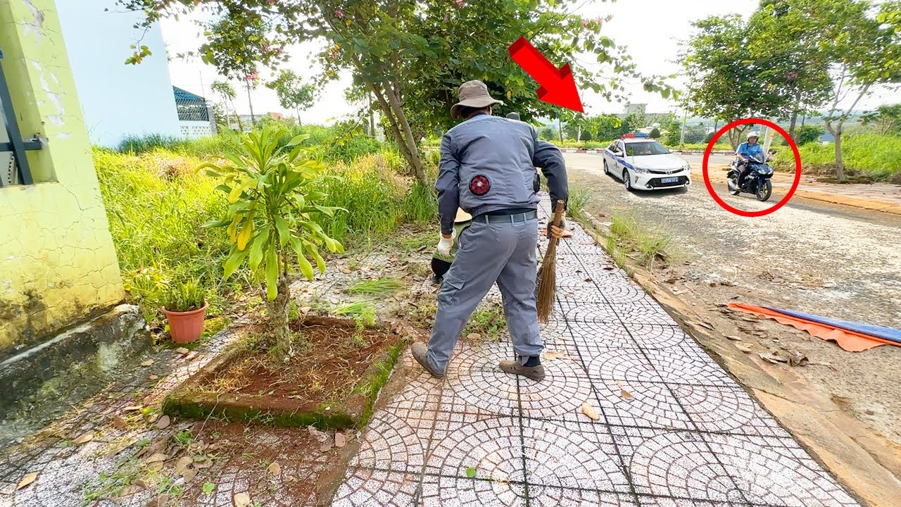 The POLICE OFFICER LOOKED SUSPICIOUS and didn't believe we were CLEANING THE SIDEWALK FOR FREE