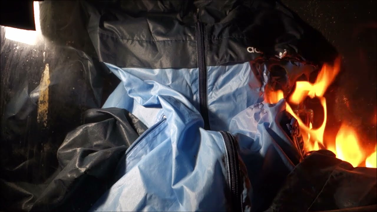 Adidas Glanznylon Regenjacke, close up view.  Nice burning!
