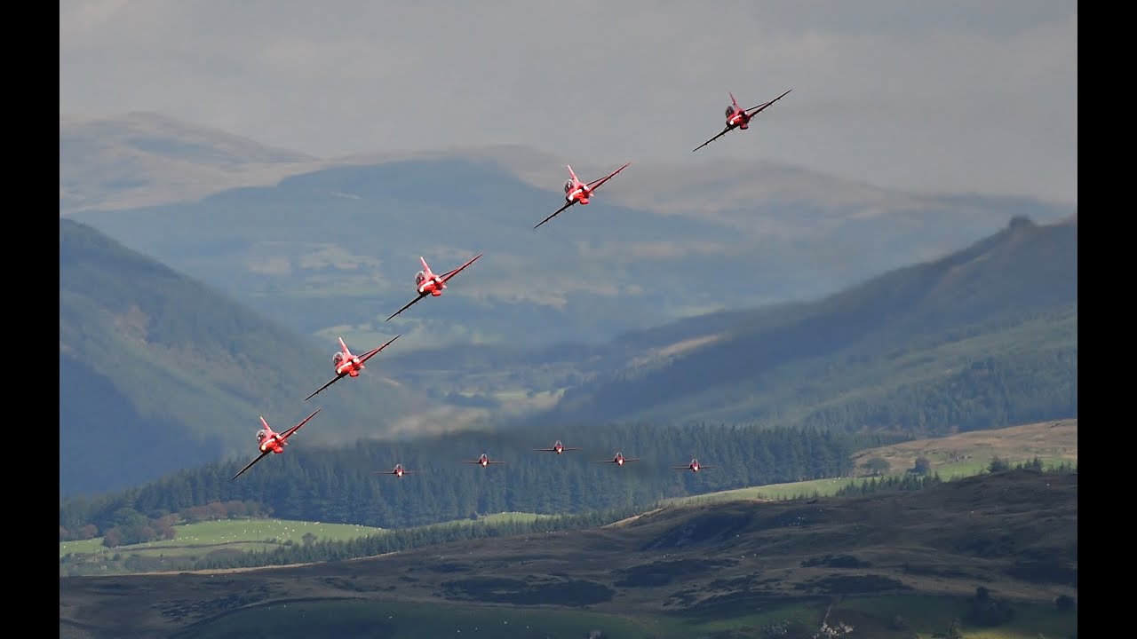 RAF Red Arrows transit in Formation  through  Mach Loop Snowdonia Wales.