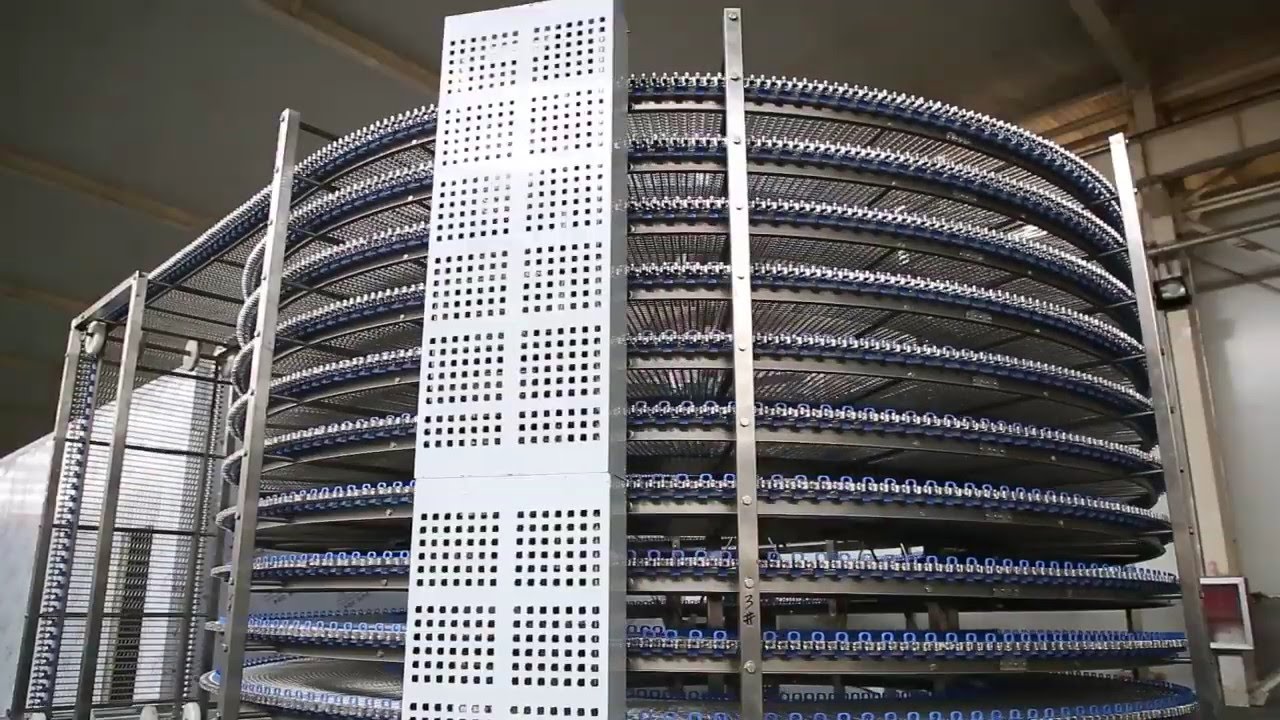 Spiral cooling conveyor for bread cooling