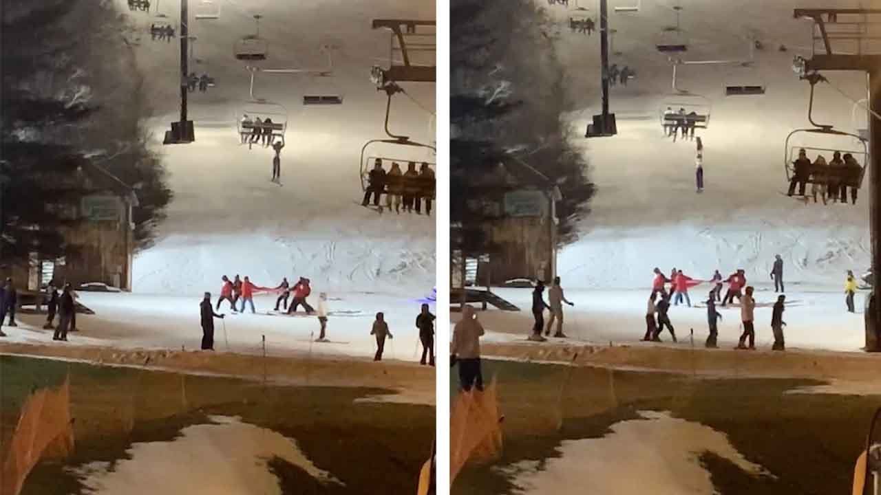 Skier Caught In Her Jacket Falls Safely From Ski Lift