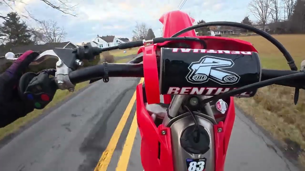 Riding wheelies past cars on crf250r