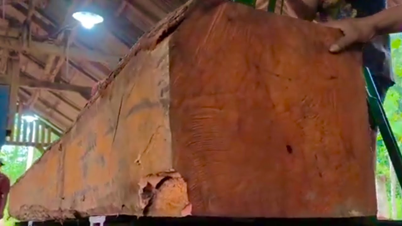 The process of sawing giant redwood blocks produces beautiful planks.