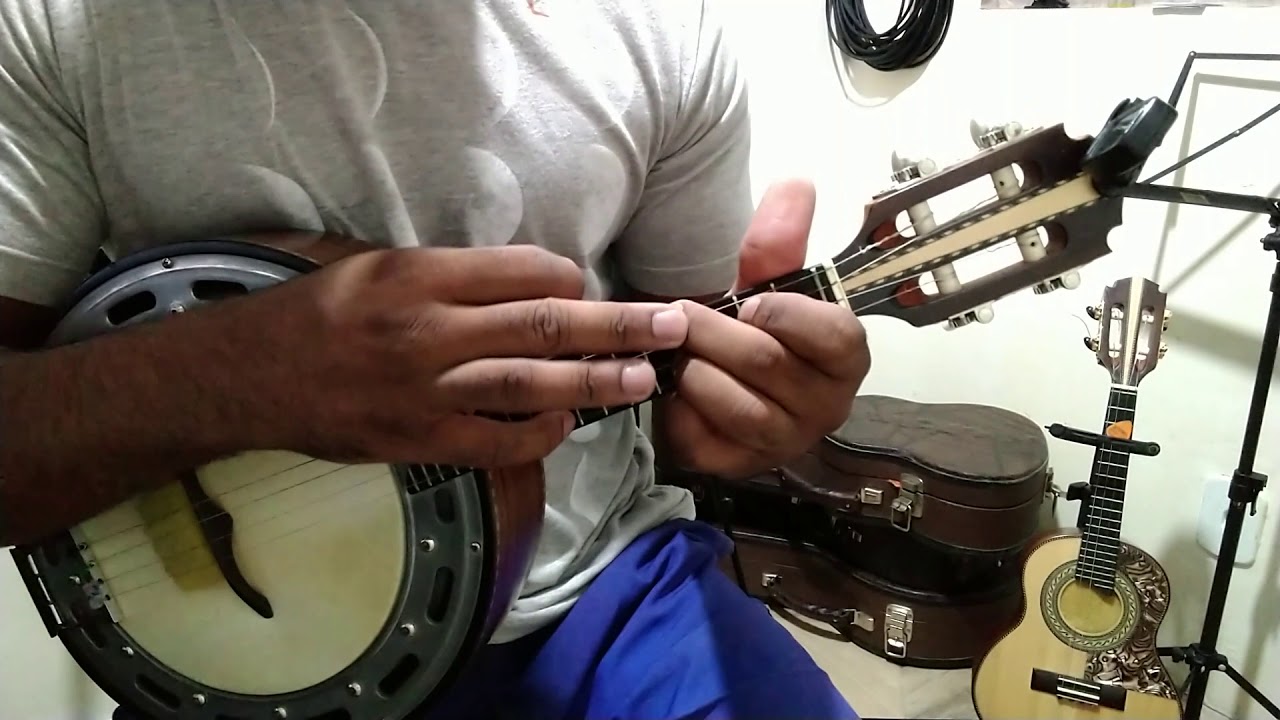 TOQUE JIBOIA DO MESTRE ALMIR GUINETO COM APENAS 4 ACORDES ( AULA DE BANJO )