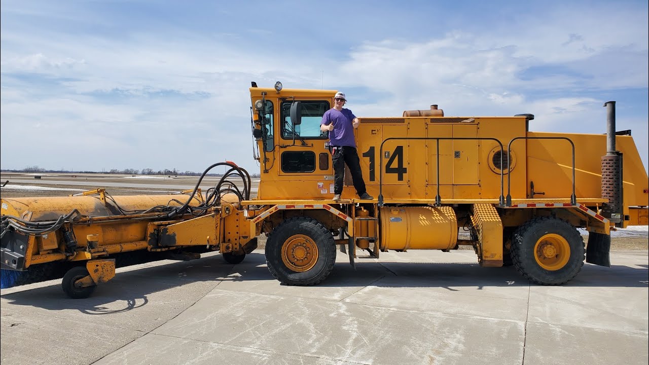 Testing out our new Oshkosh airport runway sweeper!