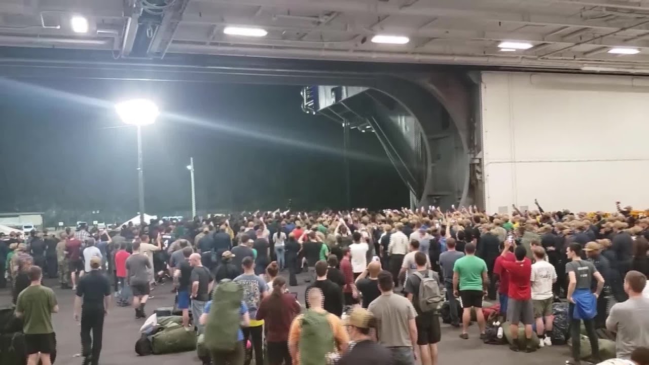 Removed USS Theodore Roosevelt captain gets warm send-off