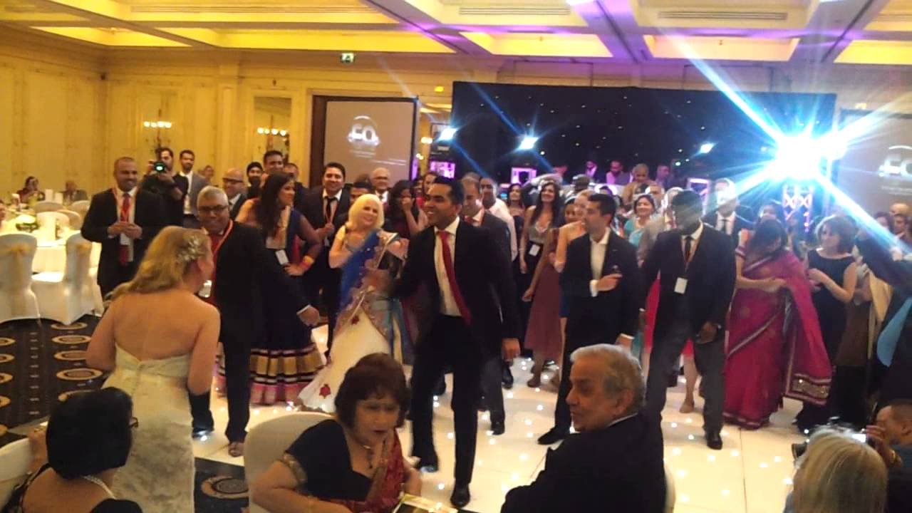 Groom surprises Bride with group dance.