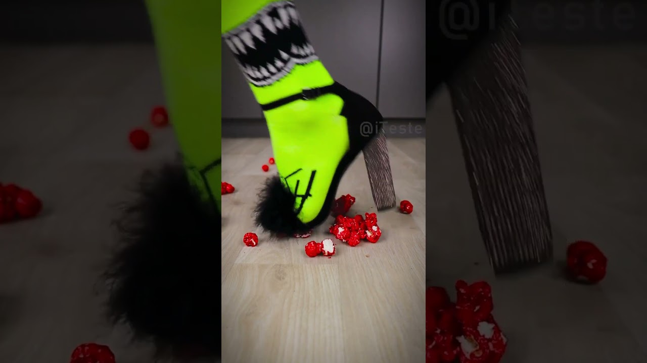Black high heels smash some red chips 