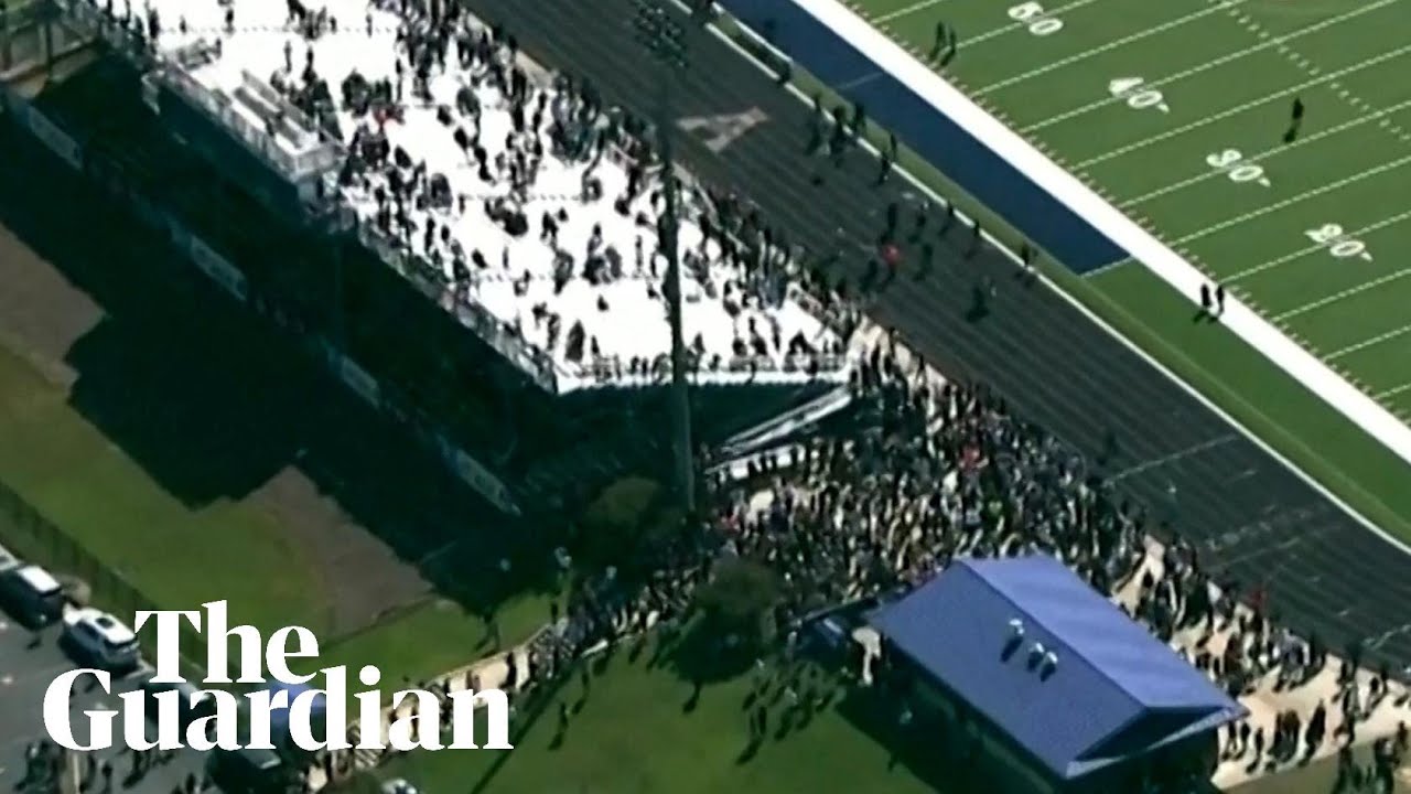 Aerial video shows evacuated students in football field after school shooting in Georgia