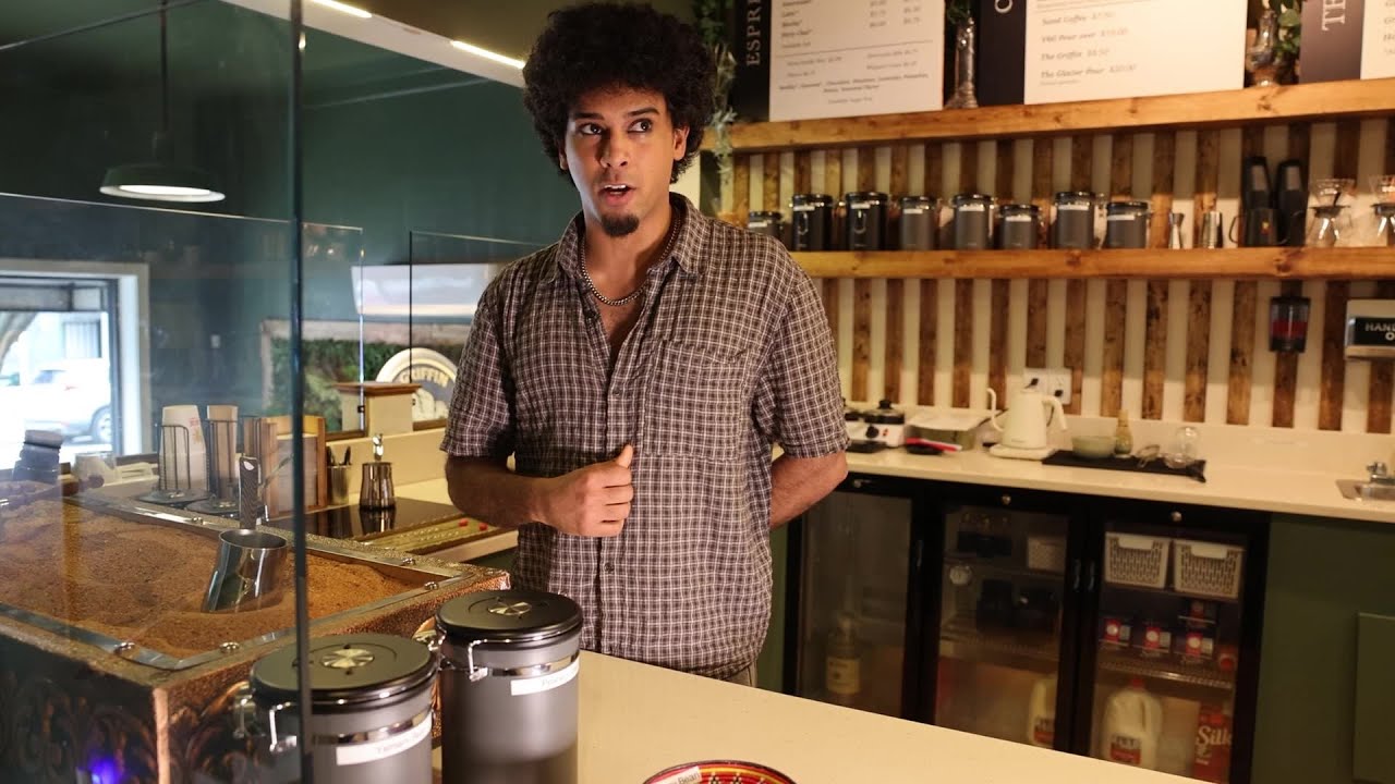 Barista Sam Sanabani makes cup of sand coffee at Griffin Coffee in Richmond, VA.,