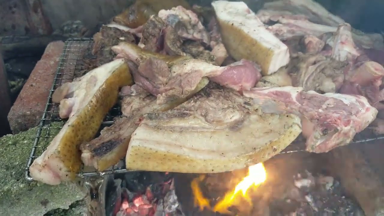 Relaxing wild boar roast by the beach.Apai Jawai team. Non Halal
