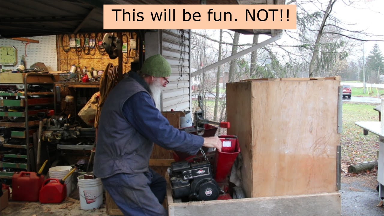 Wood chipper repairs - part 2: oil change - with subtitles