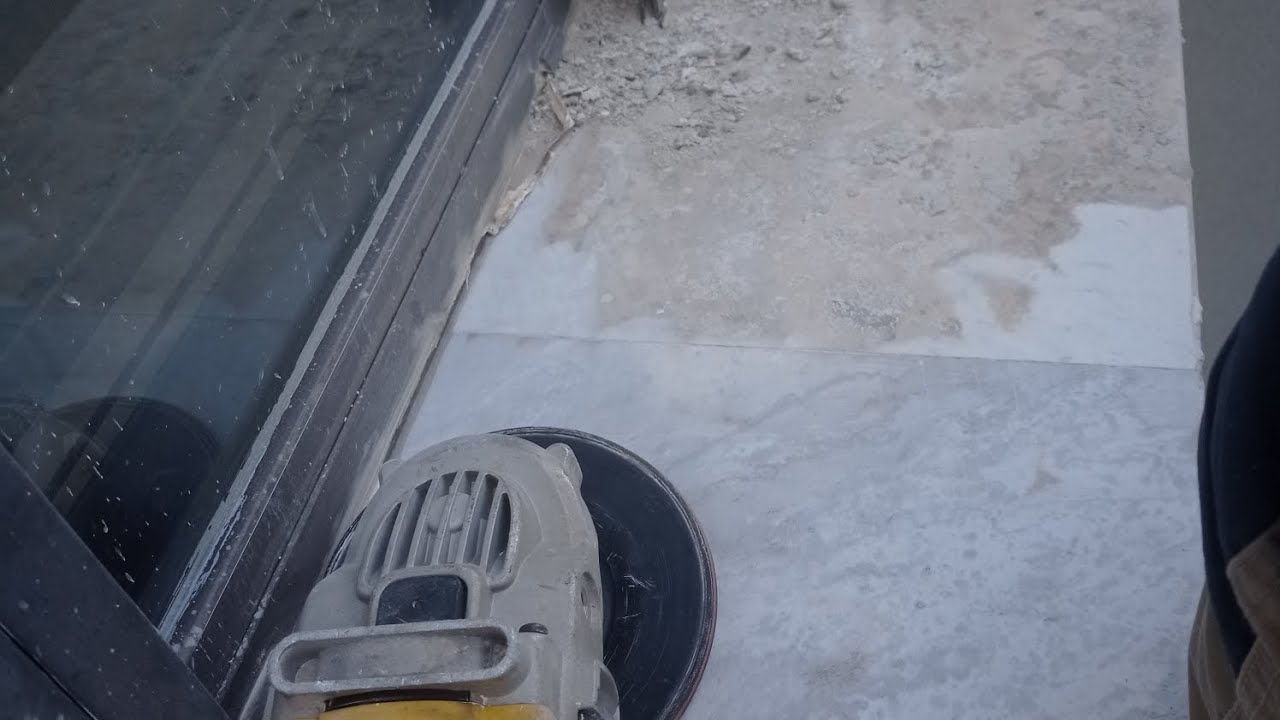 RESTAURO DI UNA SOGLIA IN MARMO DI CARRARA
