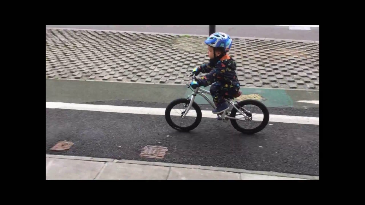 2 year old rides Early Rider Belter 16