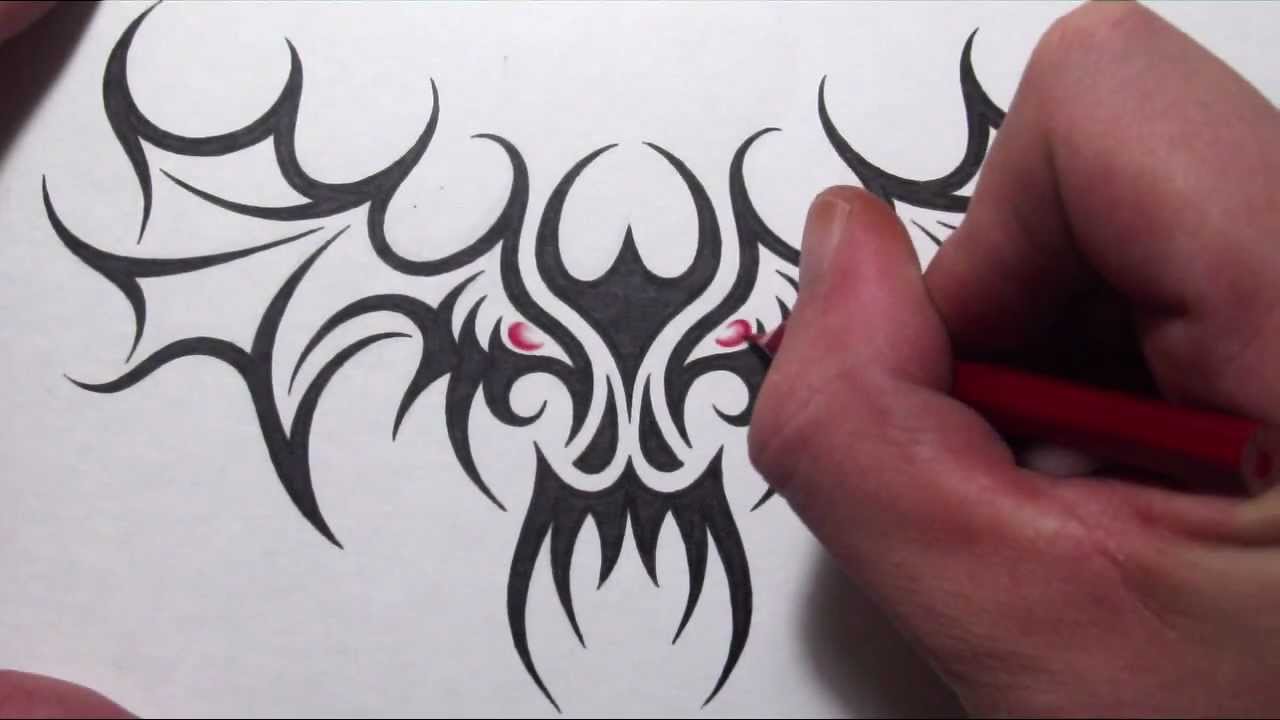Drawing a TRIBAL SKULL With WINGS Tattoo Design