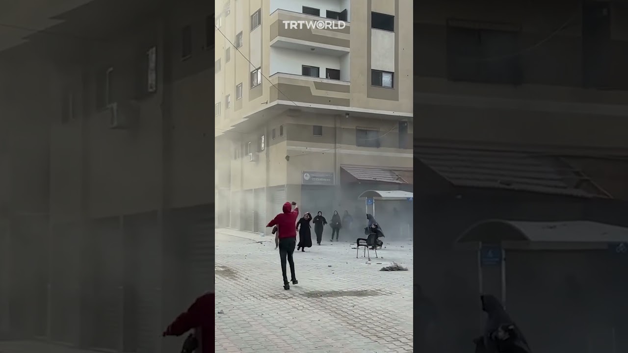 The moment Israel hit a residential building in Gaza as Palestinians were fleeing