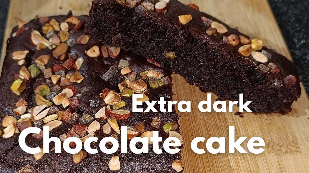 Rich extra dark chocolate cake packed with crunchy dry fruits—every bite is heaven 🍫🥜🍒