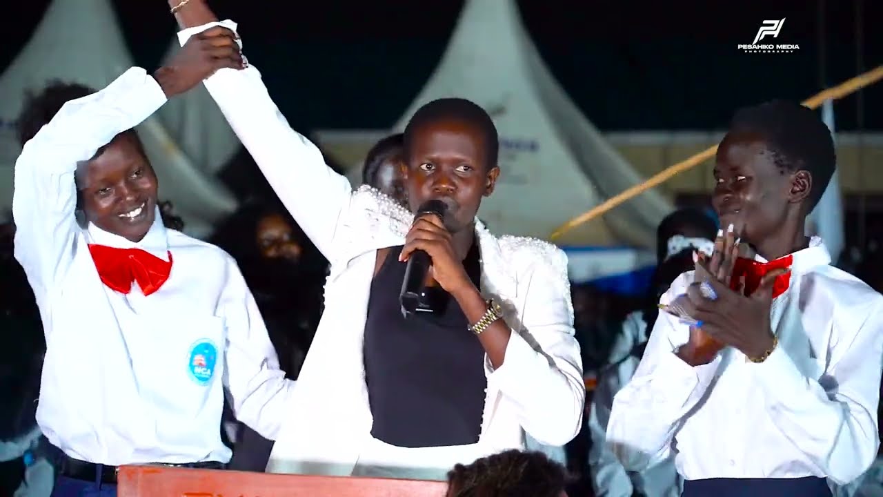 Ahou Abit Arok (Ruth Muka) with her Campaign manager Ding Akoi Deu during Air Campaign NCA Elections