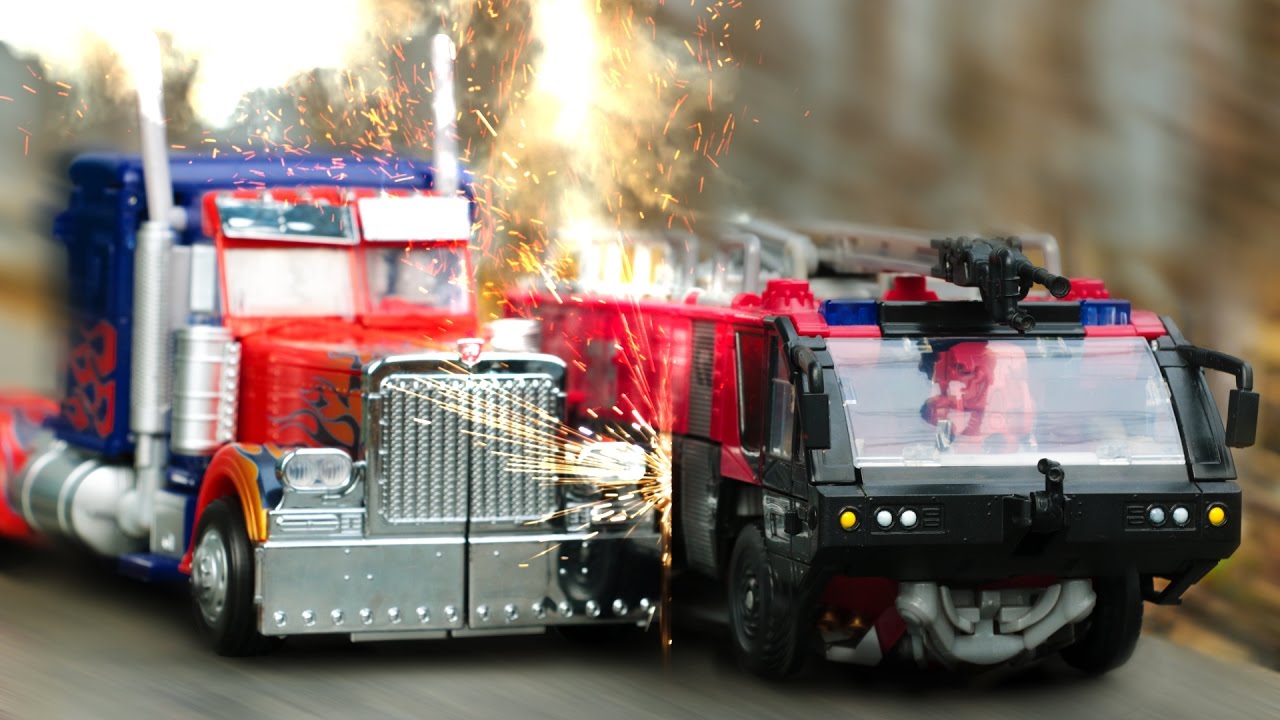 Transformers DOTM Sentinel Prime VS Optimus Prime Truck FireTruck Vehicle Robot Car Toys