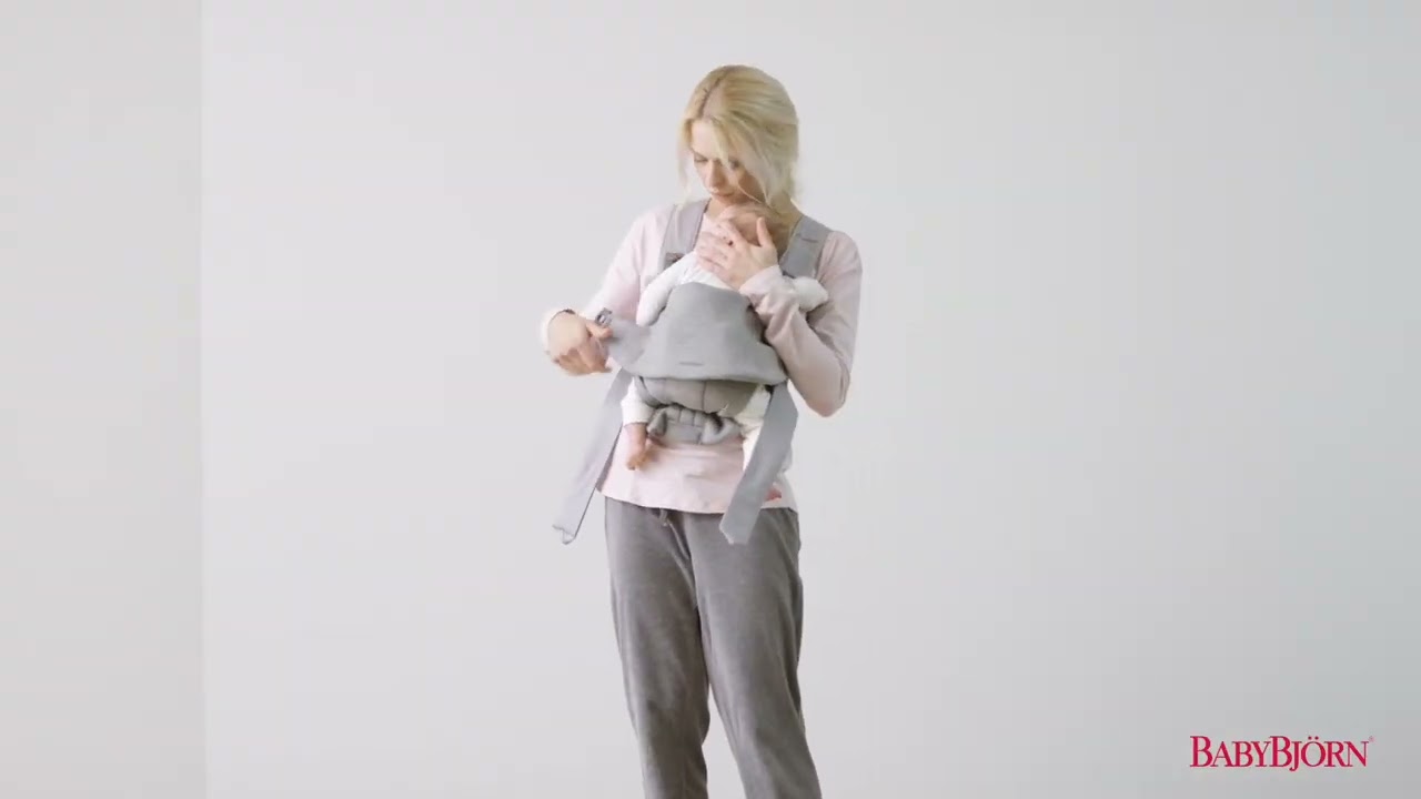 Nosidełko BABYBJ&Ouml;RN Mini - jak zapiąć niemowlę w nosidełku przodem do rodzica? | TOMI.pl